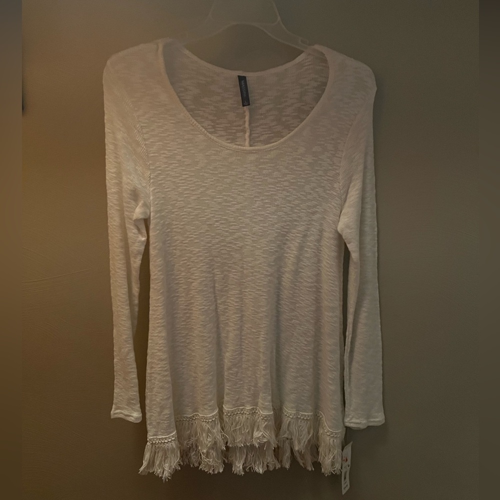 Long sweater with fringe